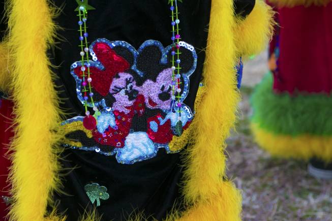 A sequenced and beaded Minney and Mickey decorate the side of this traditional Morelos, Mexico Chinelo, dancer, mask, Tuesday, Jan. 8, 2013. The "Comparza Morelense," a local Las Vegas cultural dance troupe, has been invited to perform at President Obama's inauguration parade on January 21.
